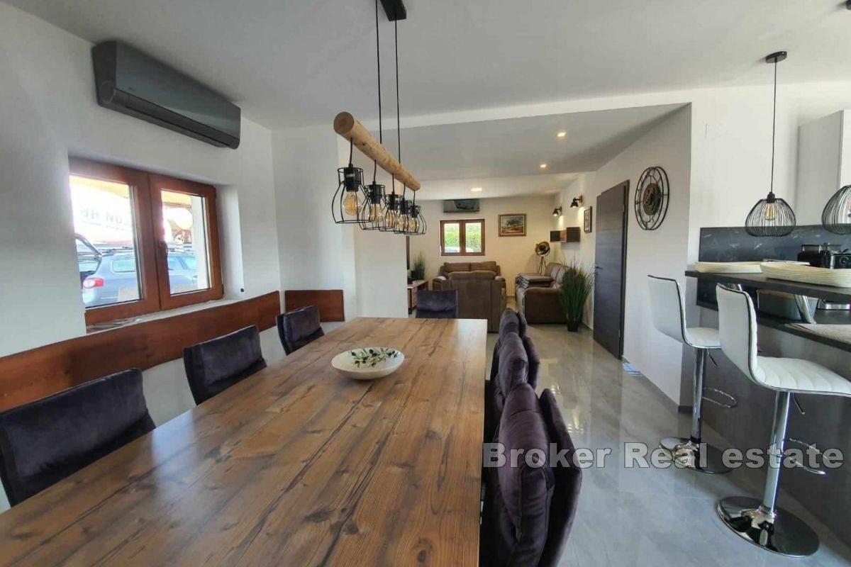 A charming house with a swimming pool and a large yard
