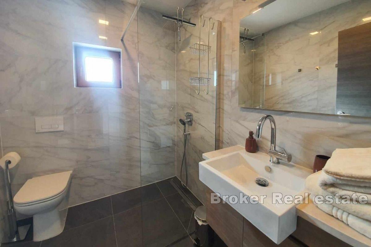 A charming house with a swimming pool and a large yard