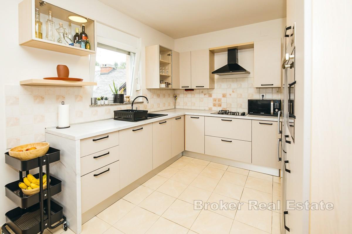 Appartement deux chambres avec garage dans un emplacement privilégié