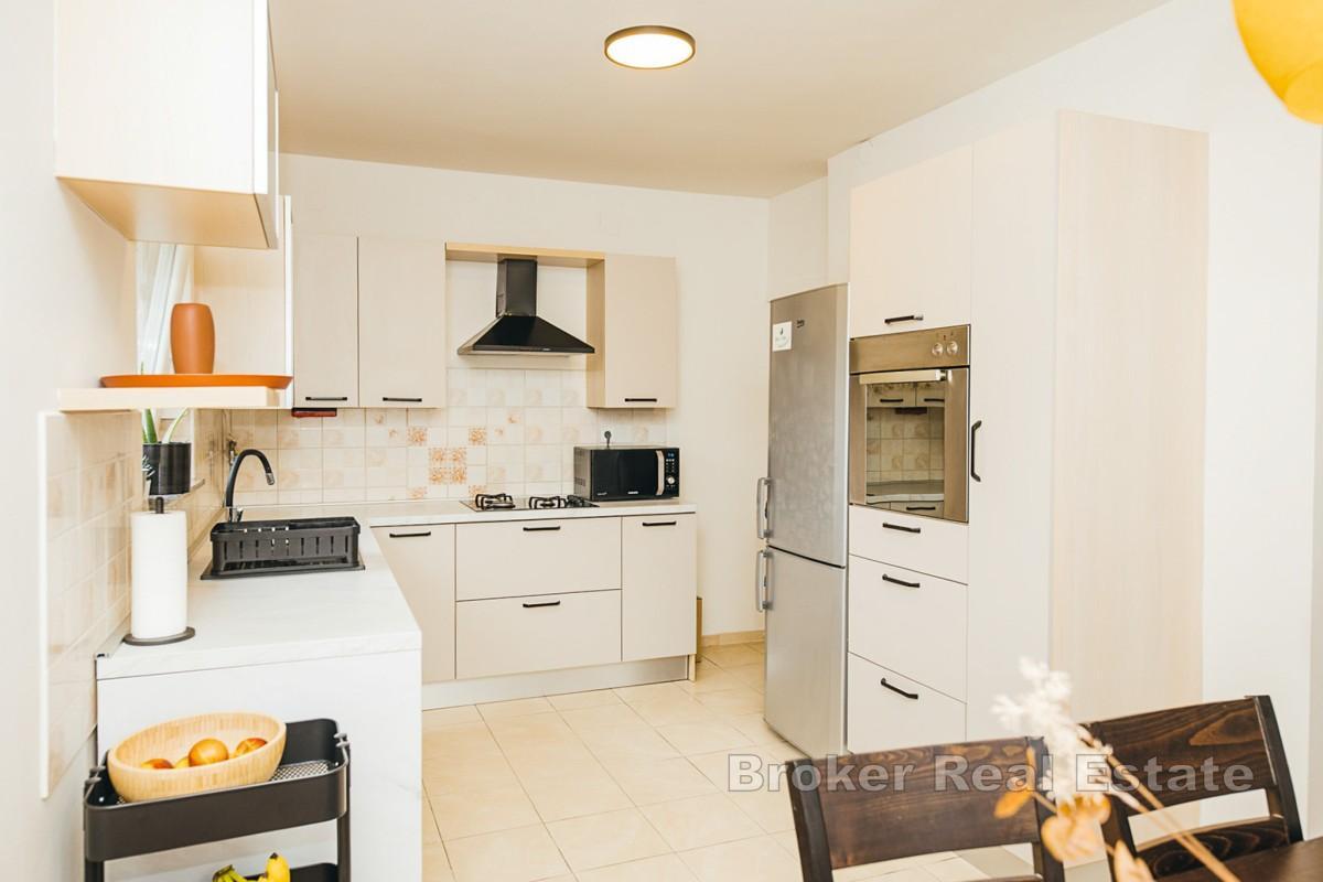Appartement deux chambres avec garage dans un emplacement privilégié