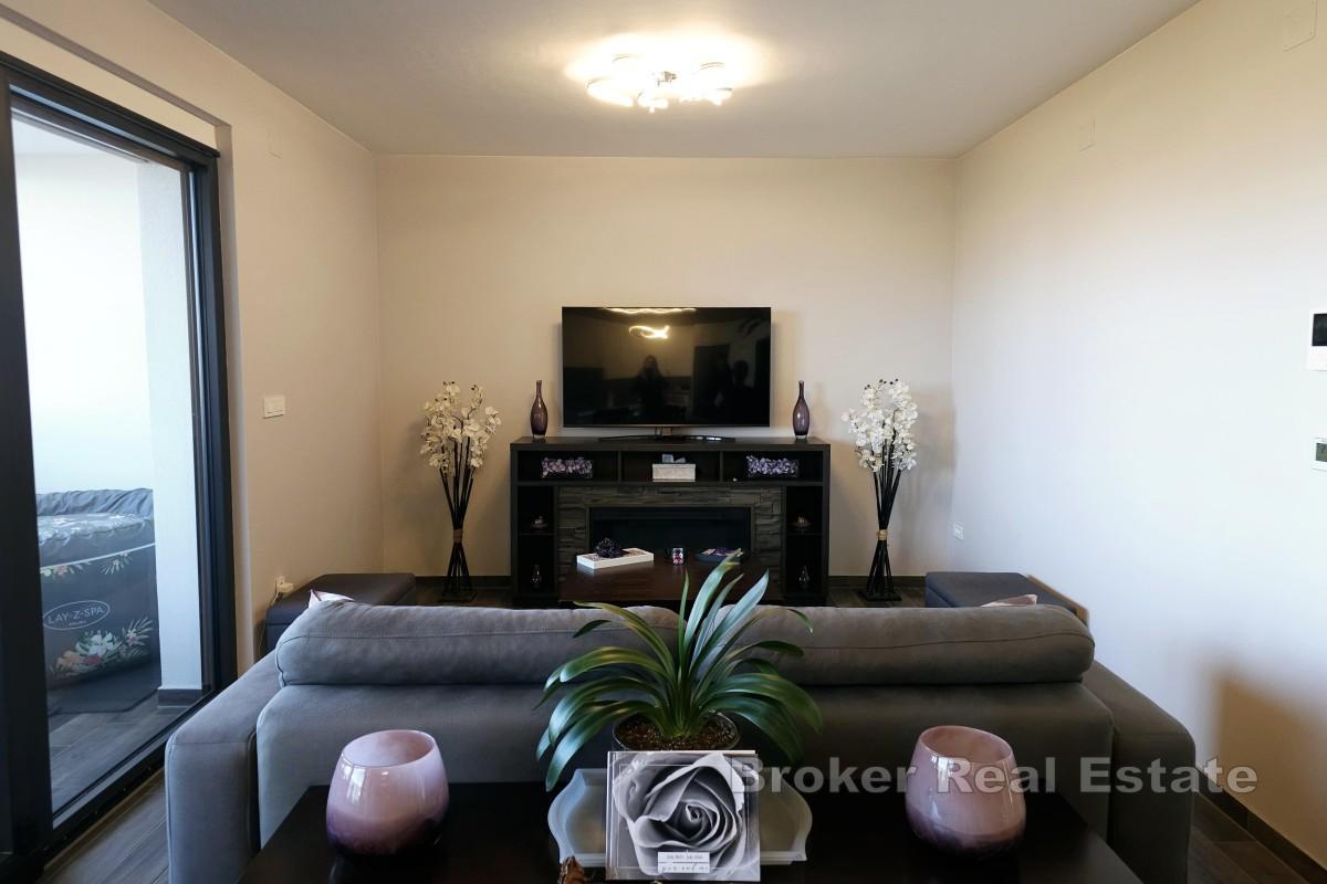 Modern lägenhet med två sovrum och terrass