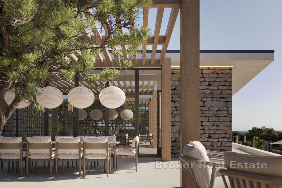 Byggnadsmark med projekt vid havet