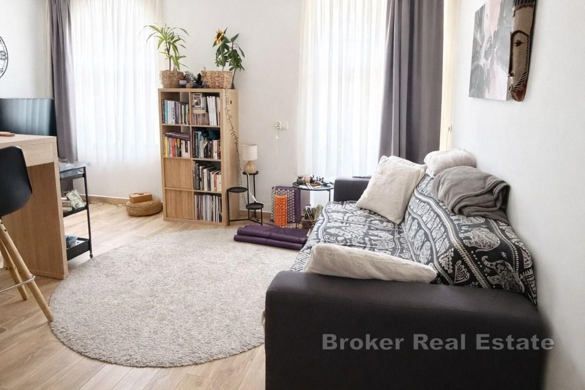 Byt rozdělený na dvě jednotky s parkovacím místem