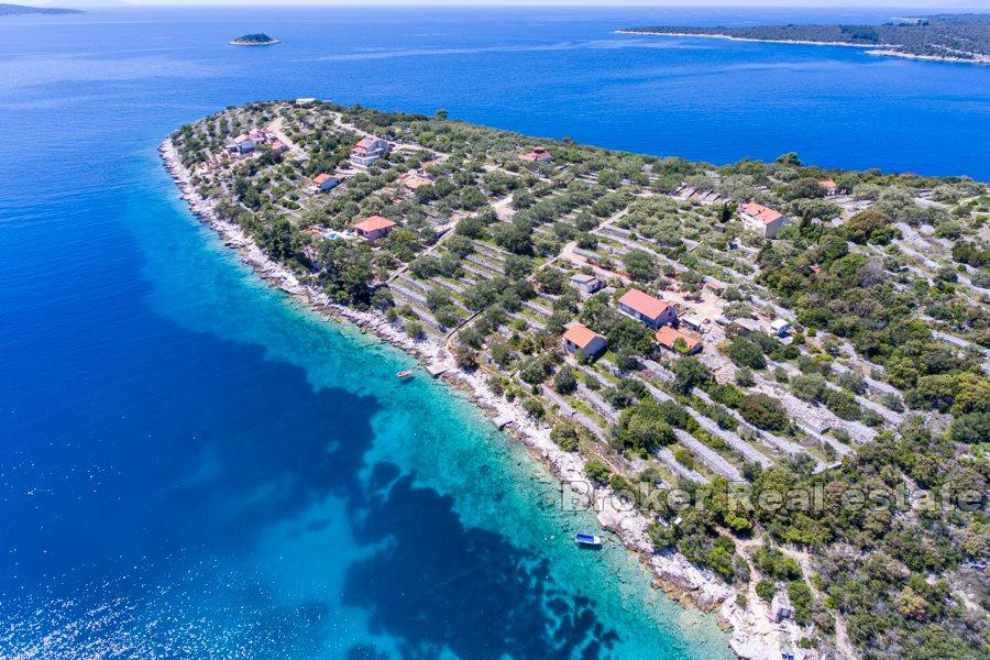 Øya Korcula, bygningsland ved sjøen