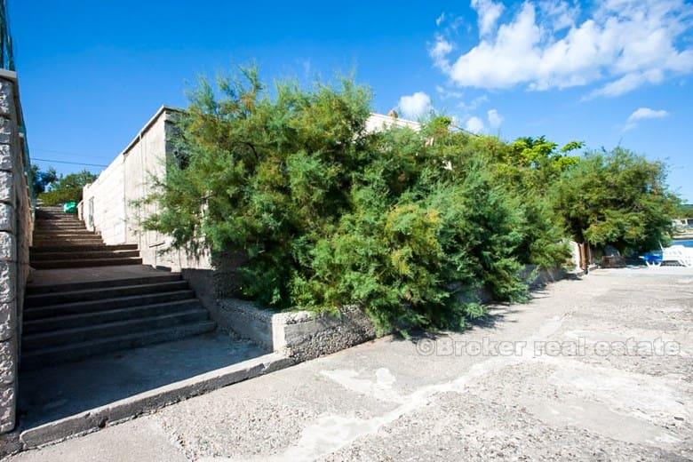 øya Korcula, hus ved sjøen