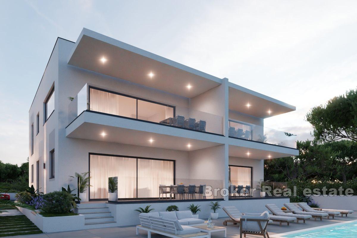 Modern apartments in a new building with a pool and a view