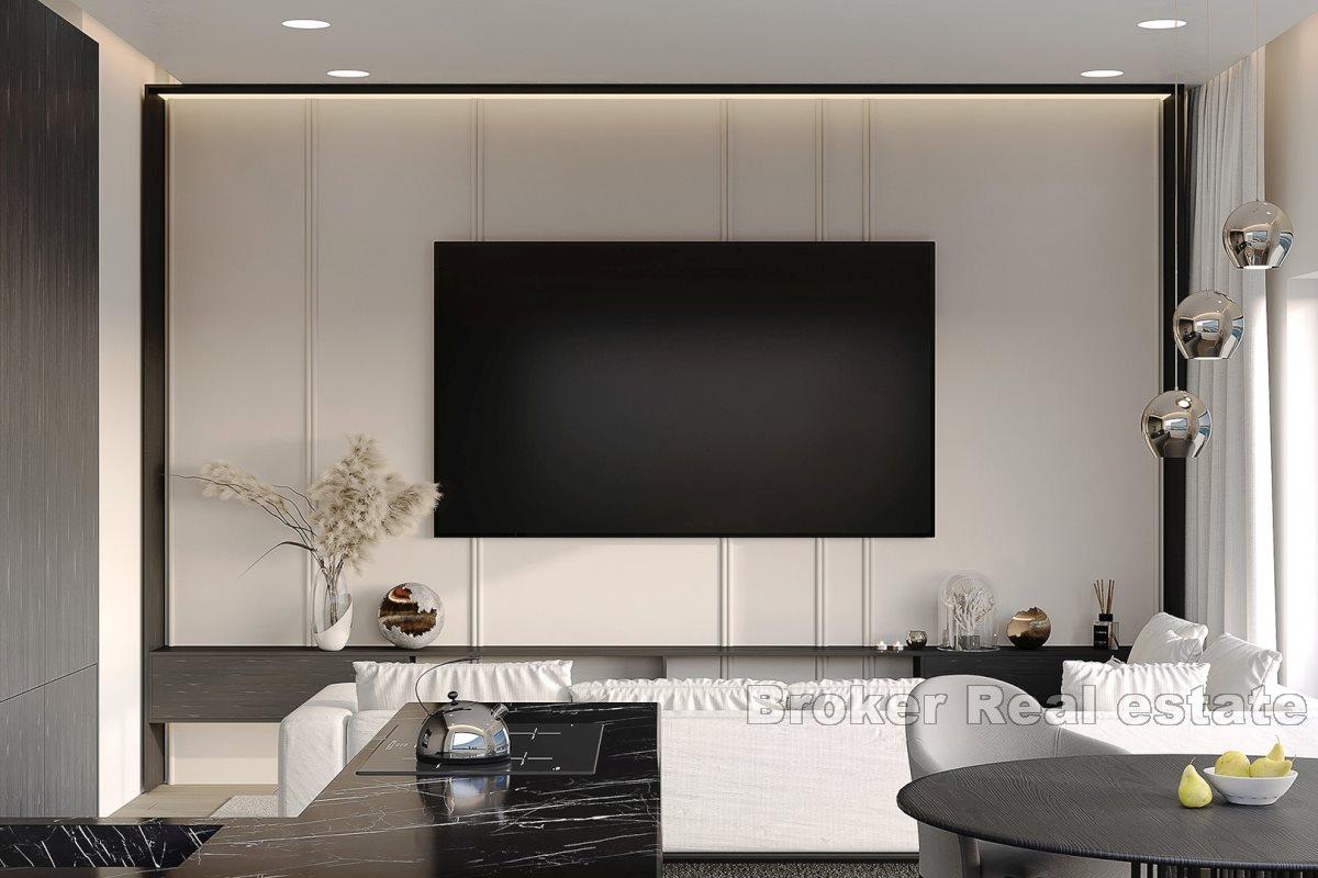 Modern apartments in a new building with a pool and a view