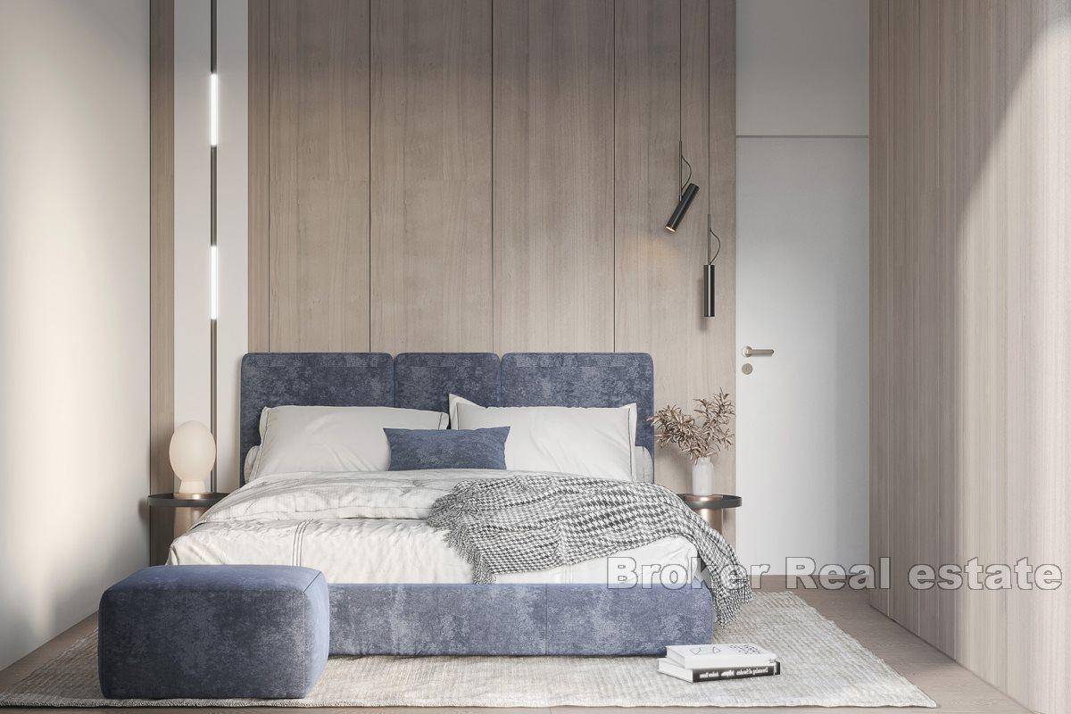 Modern apartments in a new building with a pool and a view