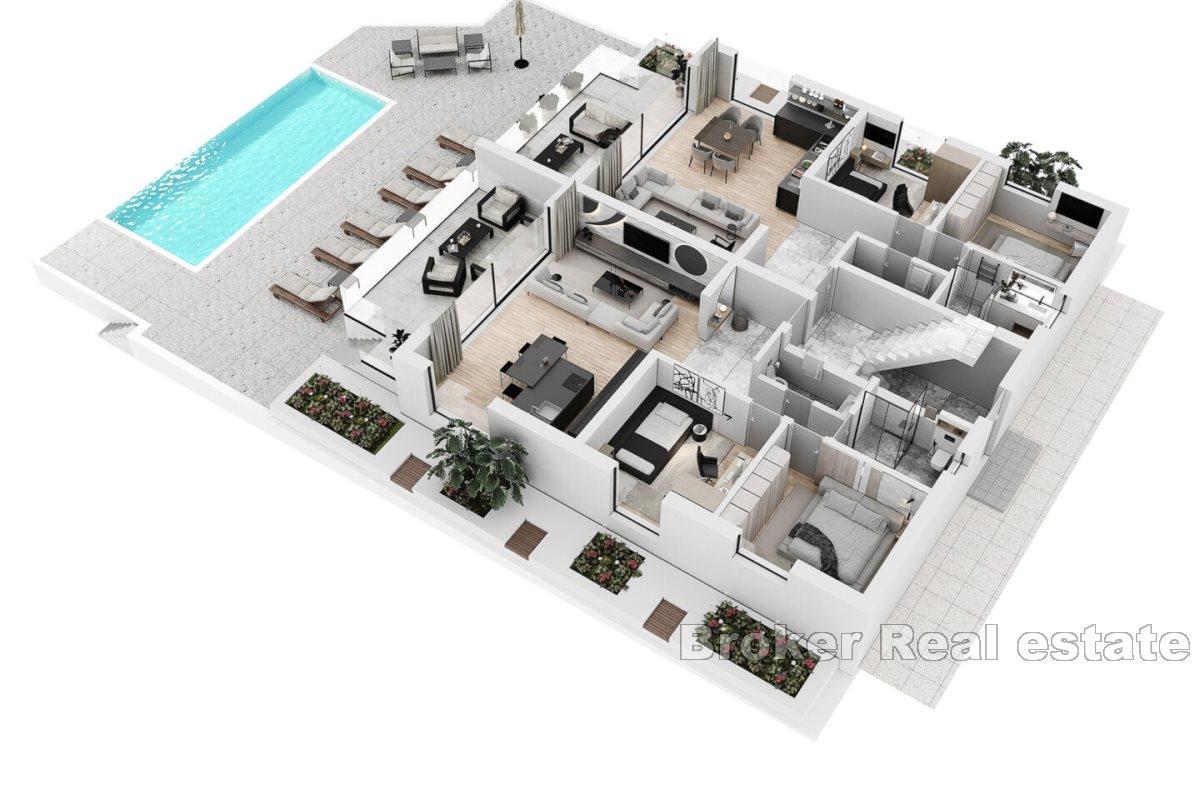 Modern apartments in a new building with a pool and a view