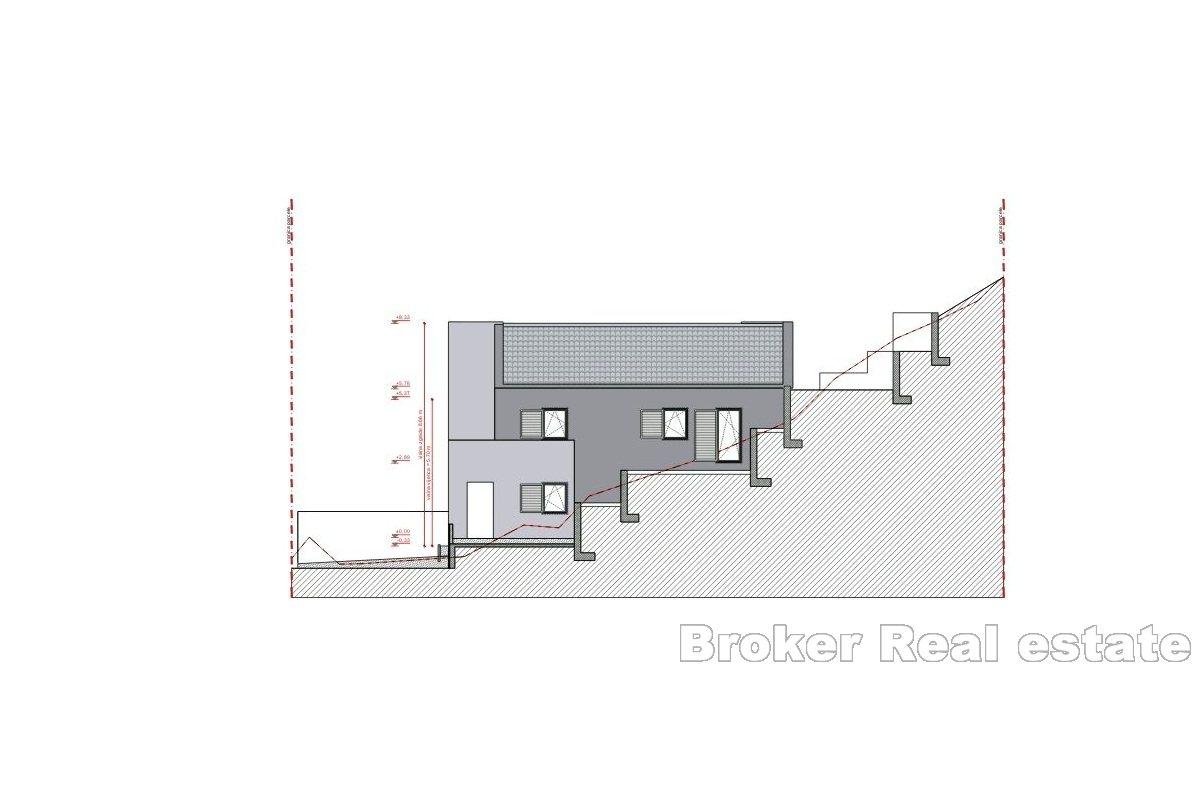 Terrain à bâtir au nord de Brač avec un projet