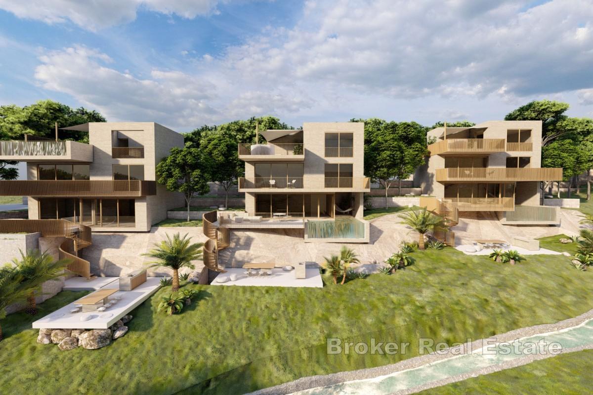 Terreno con progetto per tre ville con piscina