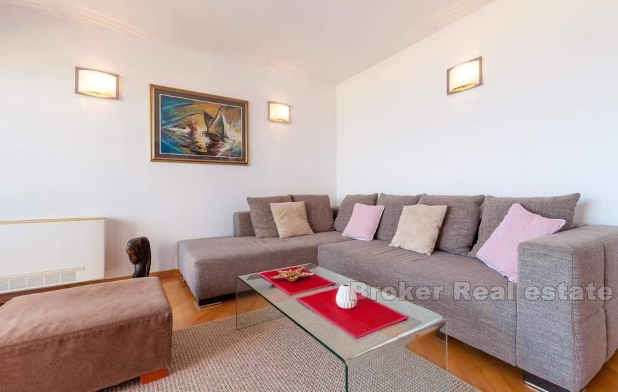 Modern three-bedroom apartment with a beautiful view of the sea