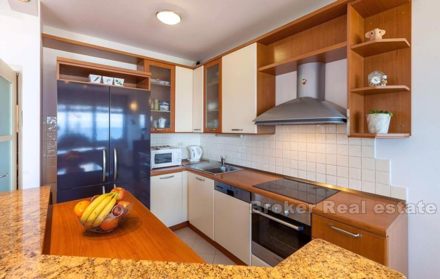 Modern three-bedroom apartment with a beautiful view of the sea