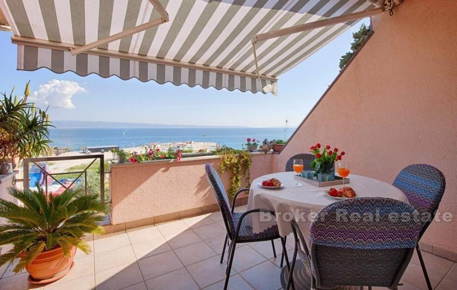 Modern three-bedroom apartment with a beautiful view of the sea