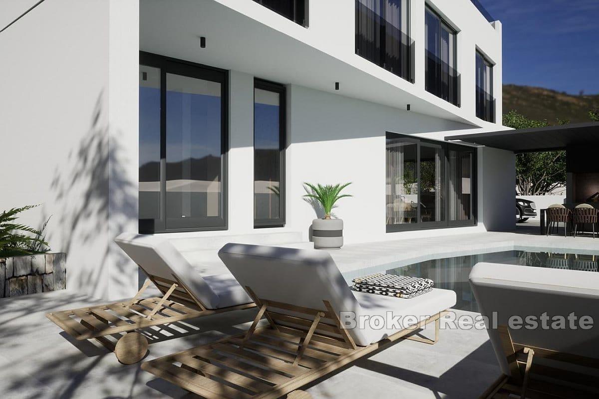 Villa under construction with pool and sea view