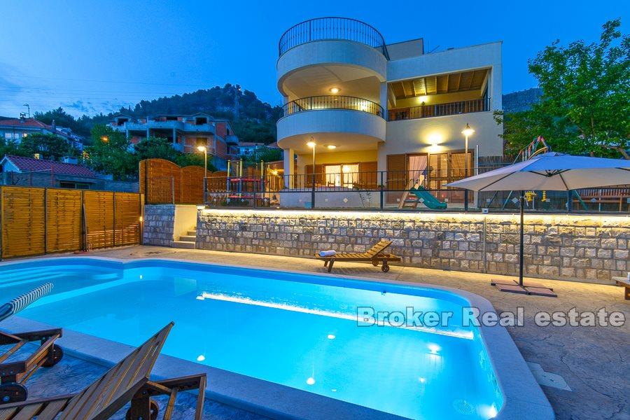 Split area, villa with pool and open view