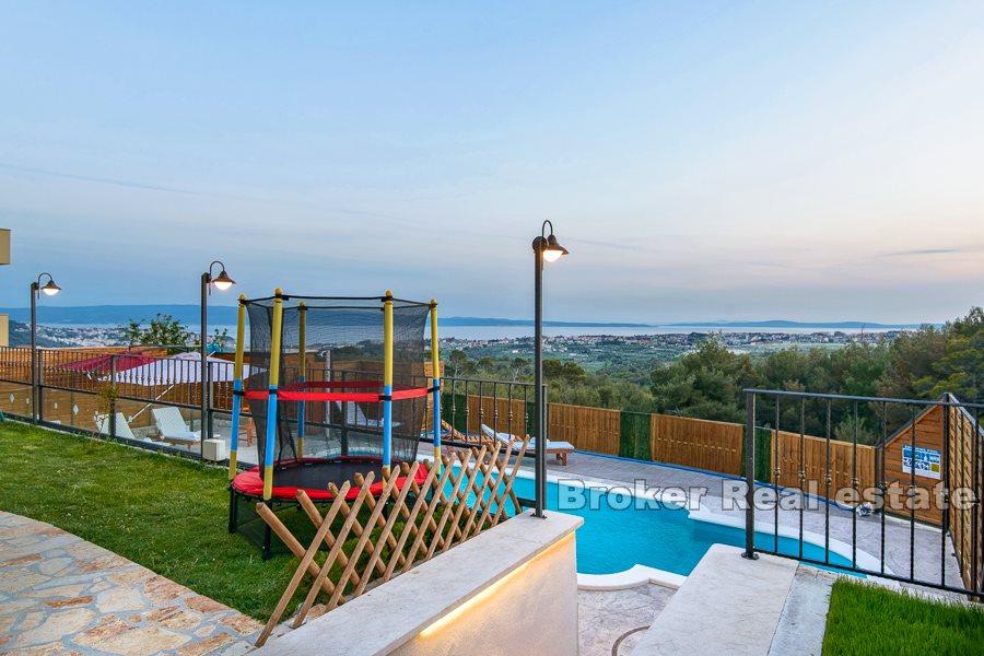 Split area, villa with pool and open view