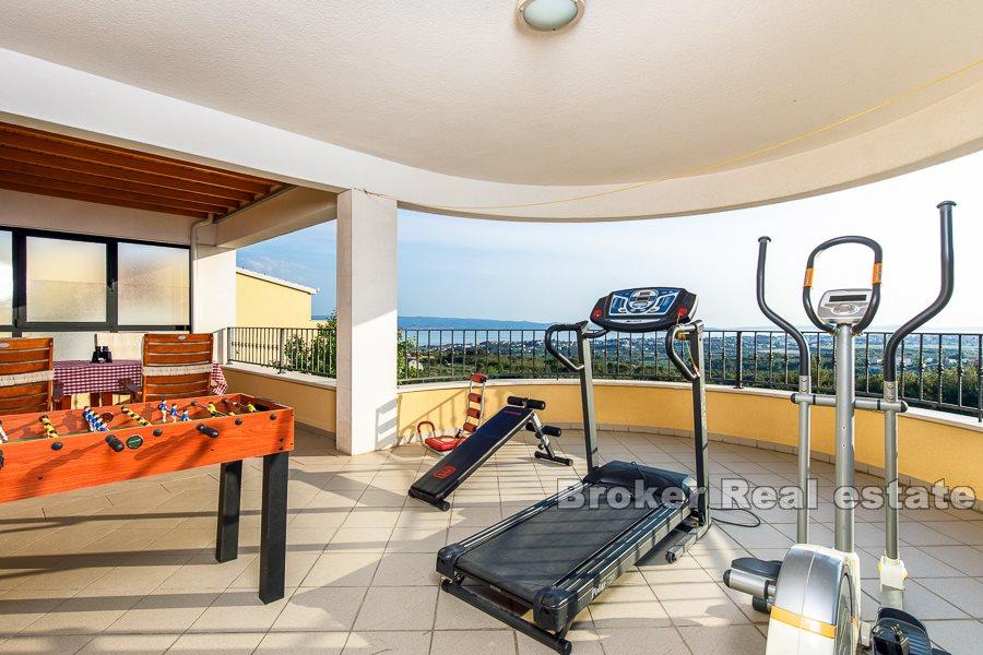 Split area, villa with pool and open view