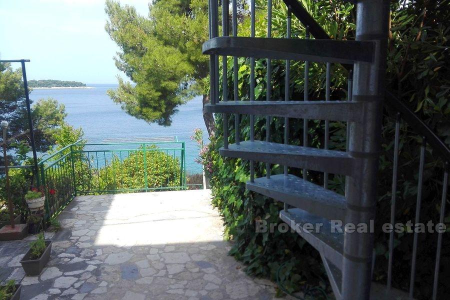 Primosten, apartment with yard, first row to the sea