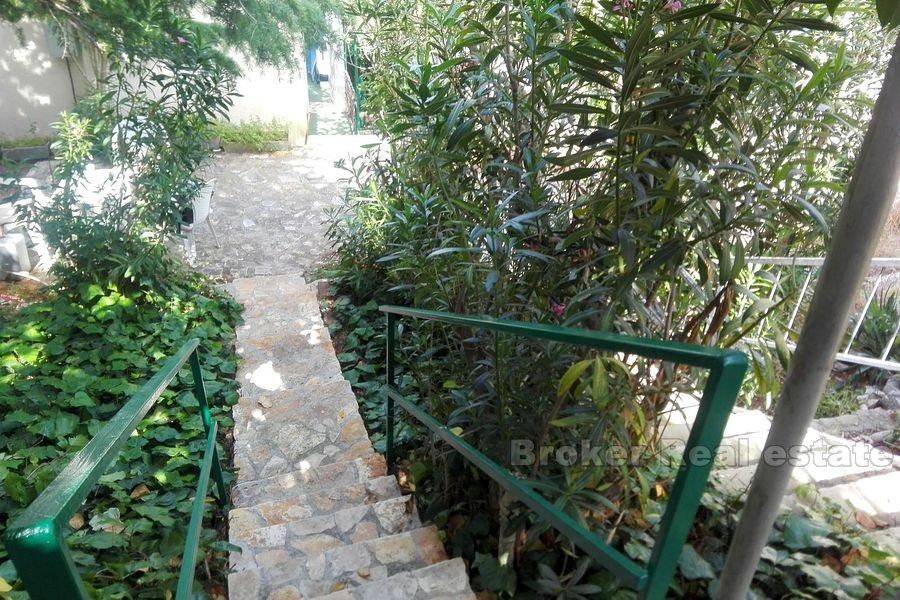 Primosten, apartment with yard, first row to the sea