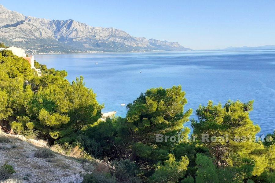 Near Omis, building land first row to the sea