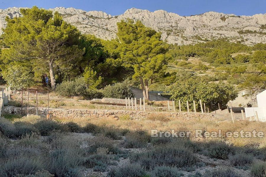 Near Omis, building land first row to the sea