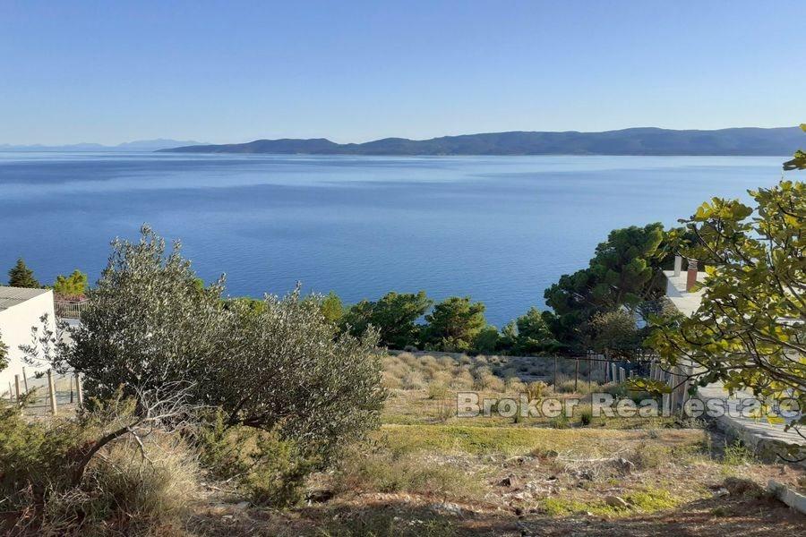 Near Omis, building land first row to the sea