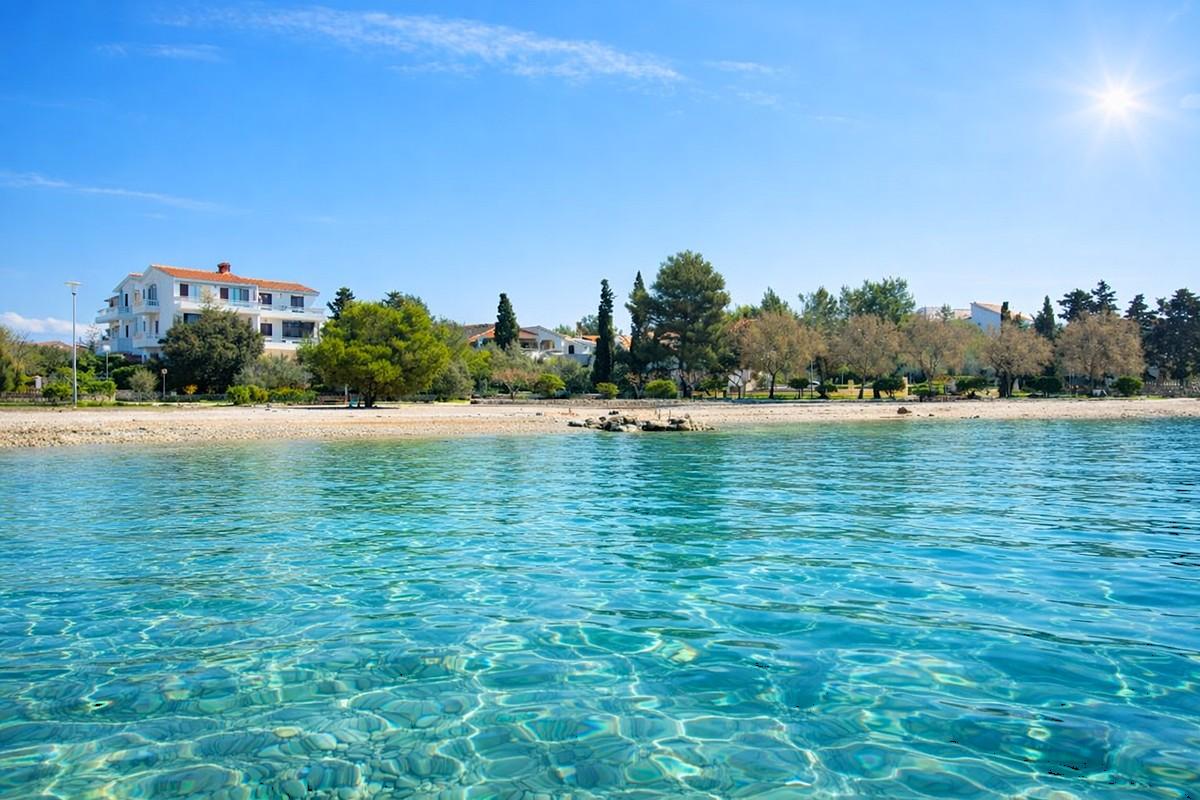 Immeuble d'appartements en première ligne de mer