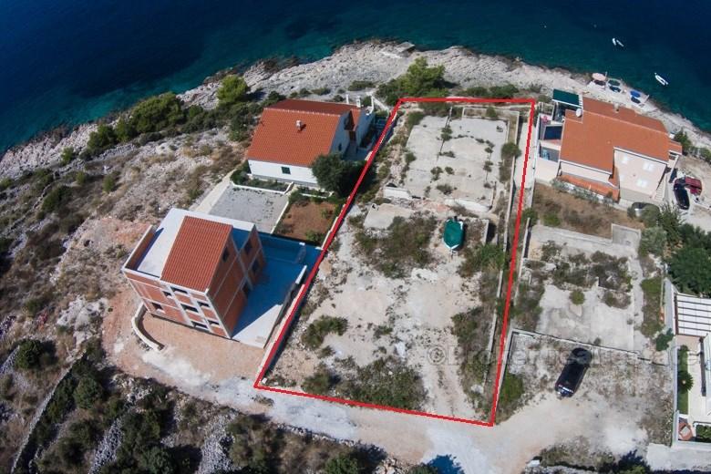 Area of Rogoznica, building land plot at first row to the sea