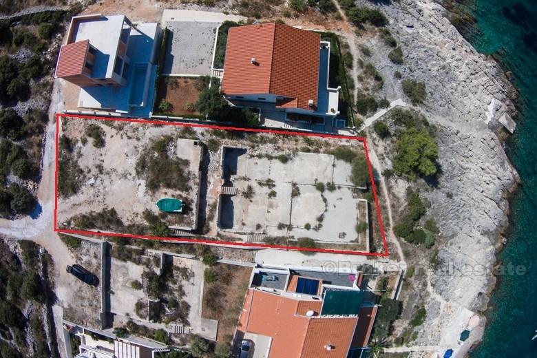 Area of Rogoznica, building land plot at first row to the sea