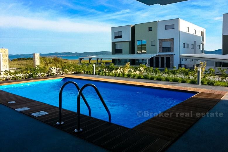 Near Zadar, semi-detached modern villa with swimming pool
