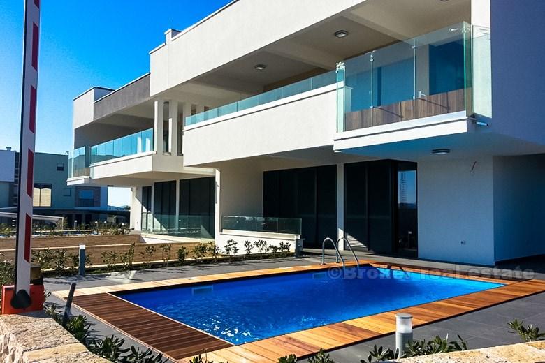 Near Zadar, semi-detached modern villa with swimming pool