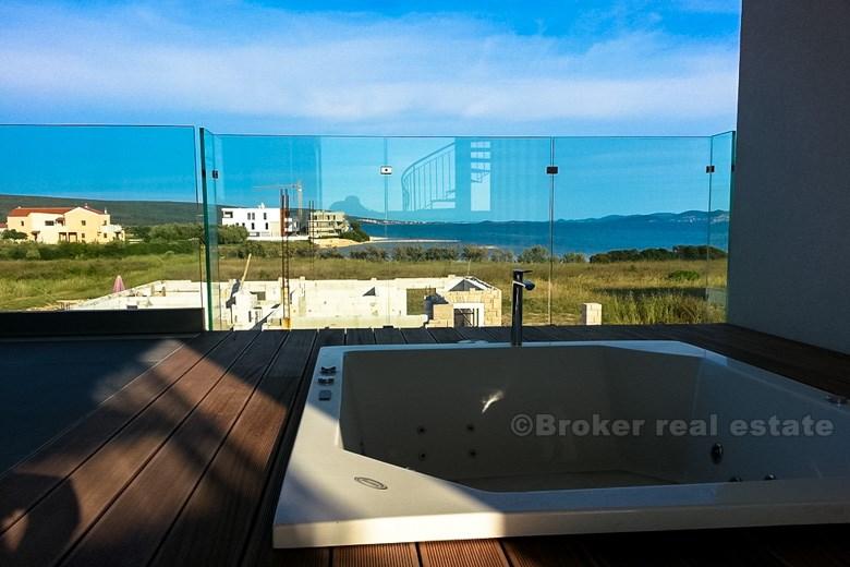 Near Zadar, semi-detached modern villa with swimming pool