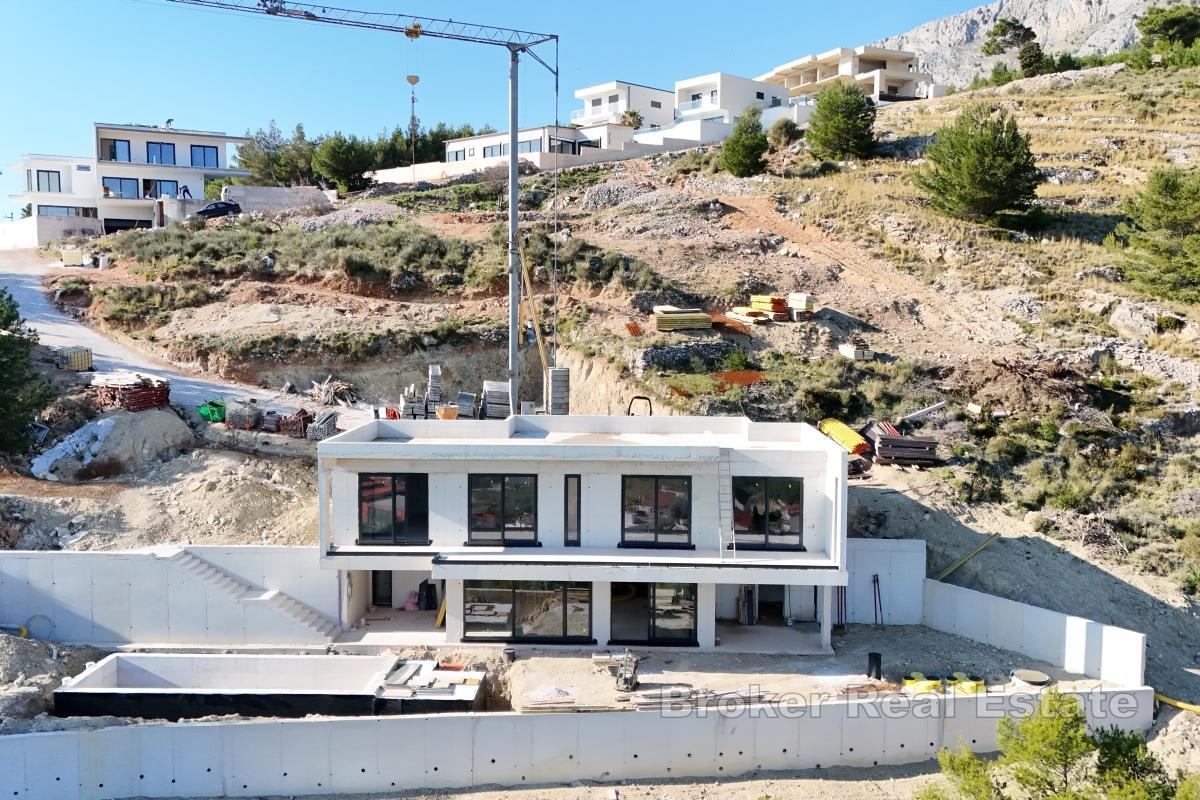 Villa under bygging med panoramautsikt over havet