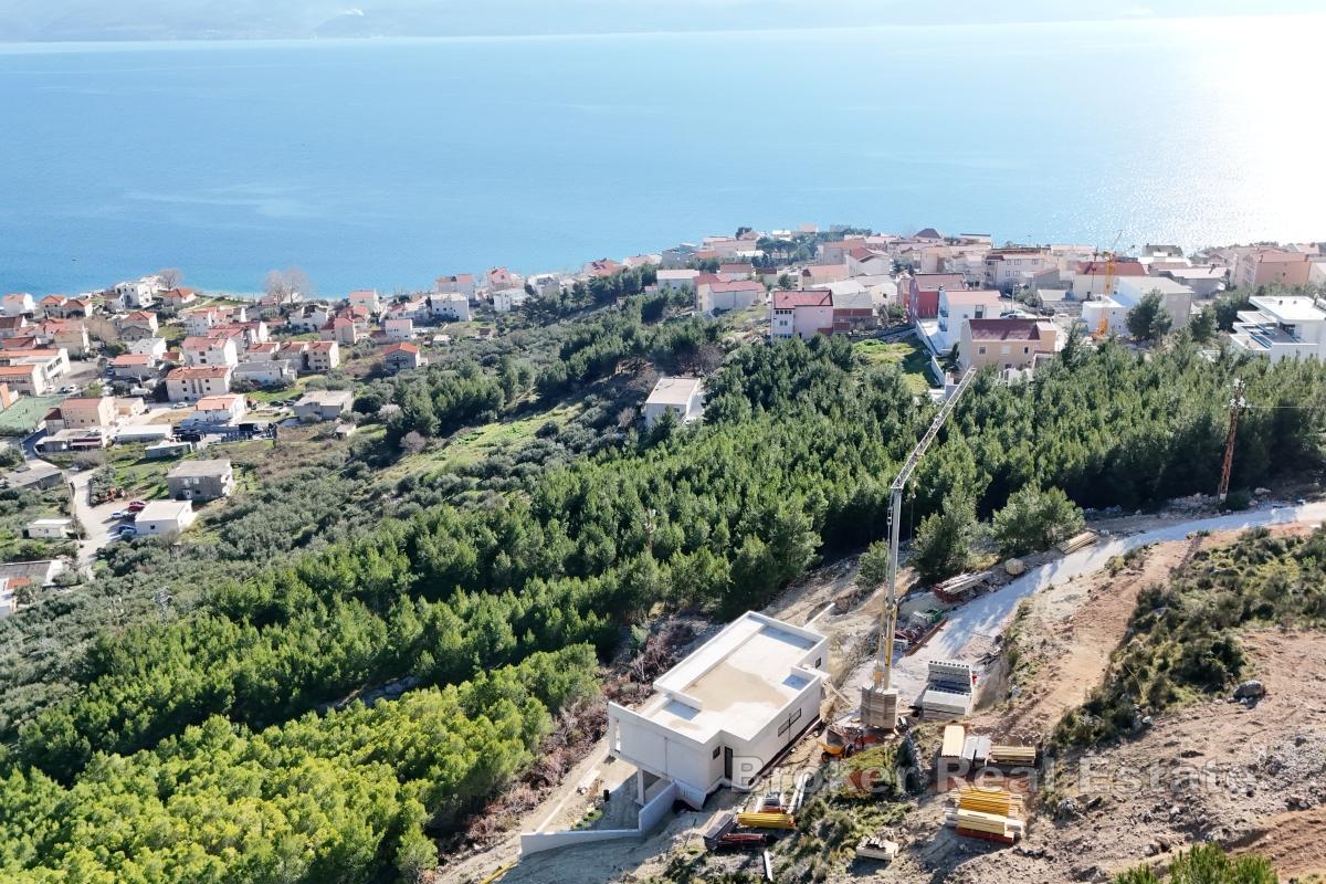 Villa under bygging med panoramautsikt over havet