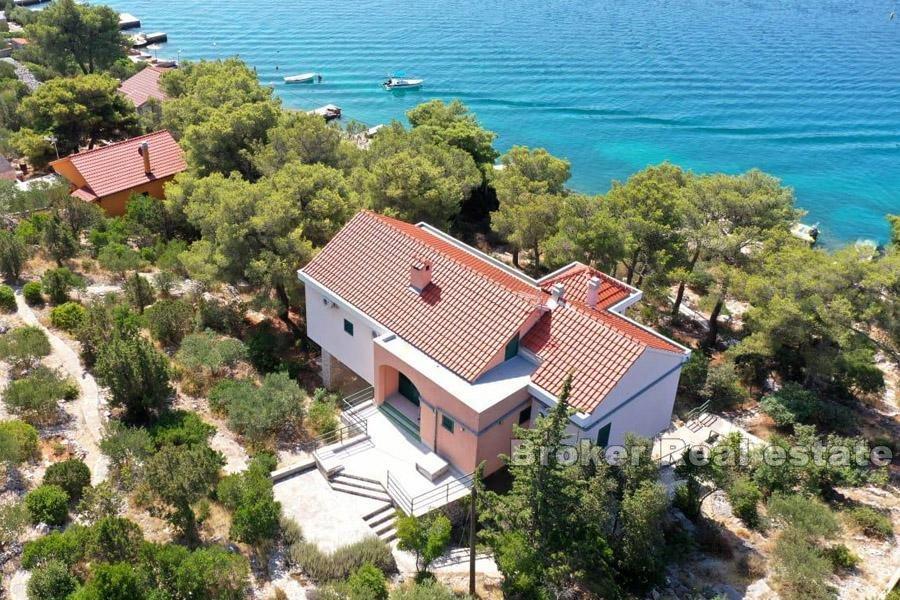 Small island, house by the sea