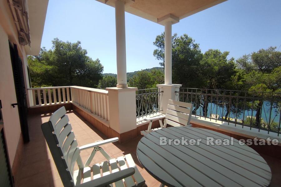Small island, house by the sea