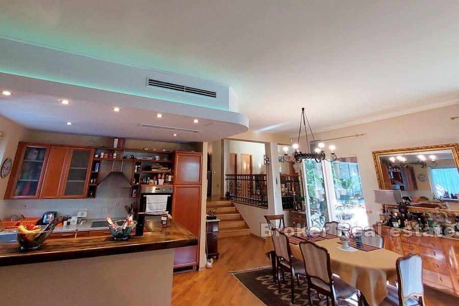 Split area - House with a swimming pool in a natural environment