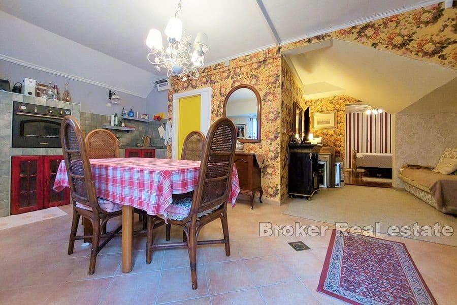 Split area - House with a swimming pool in a natural environment