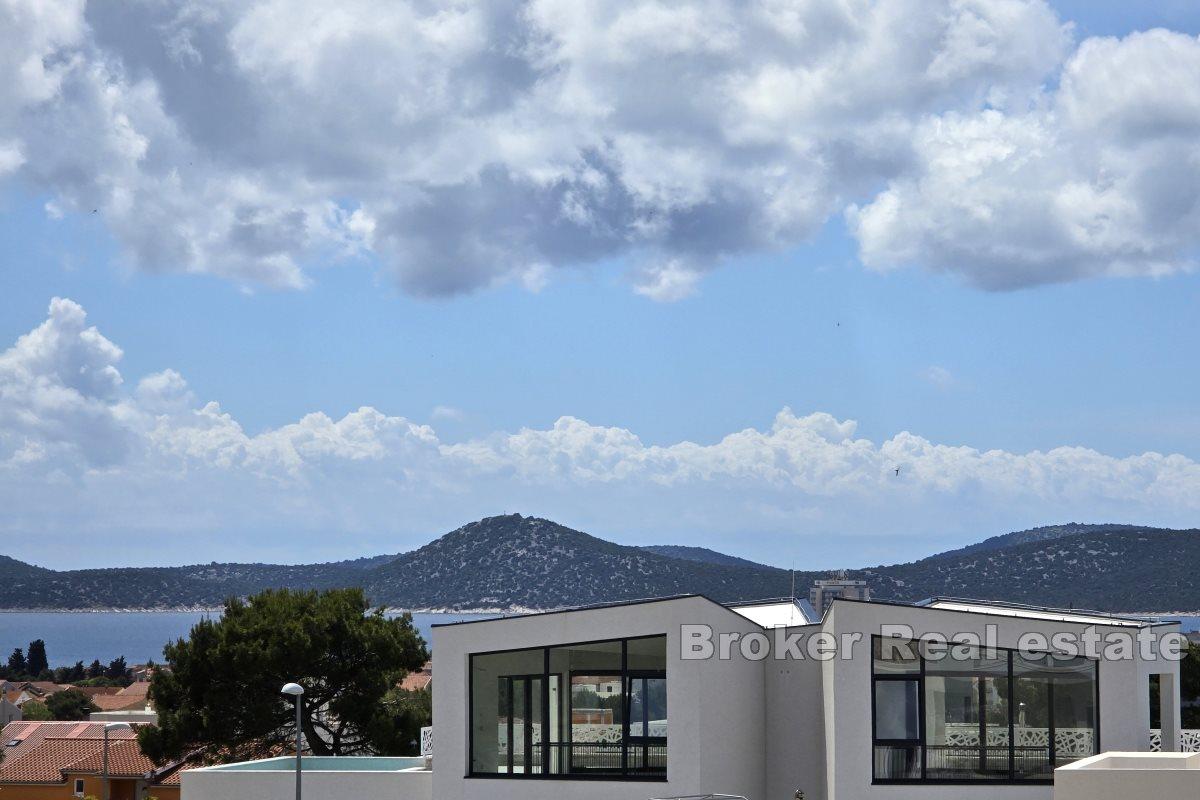 Duplex building with a view of the sea