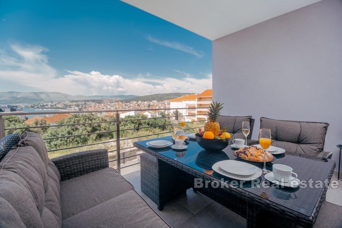 Two-room apartment with pool and sea view