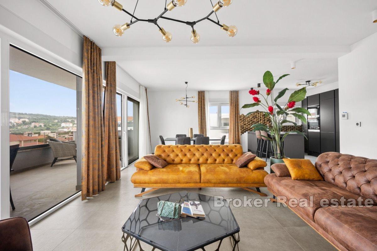 Penthouse with roof terrace and sea view