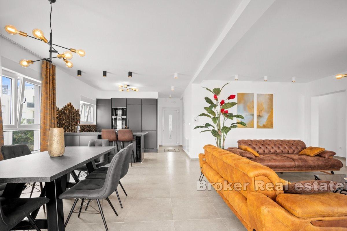 Penthouse with roof terrace and sea view