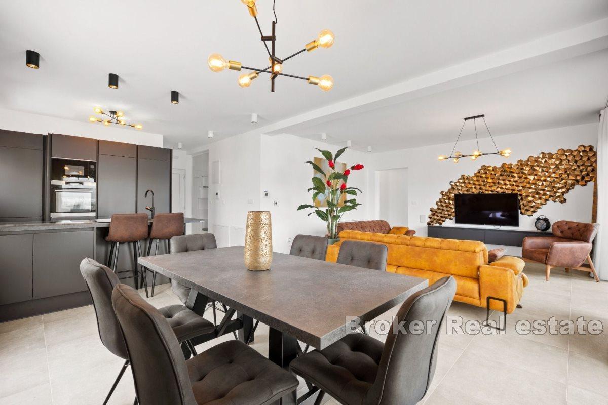 Penthouse with roof terrace and sea view
