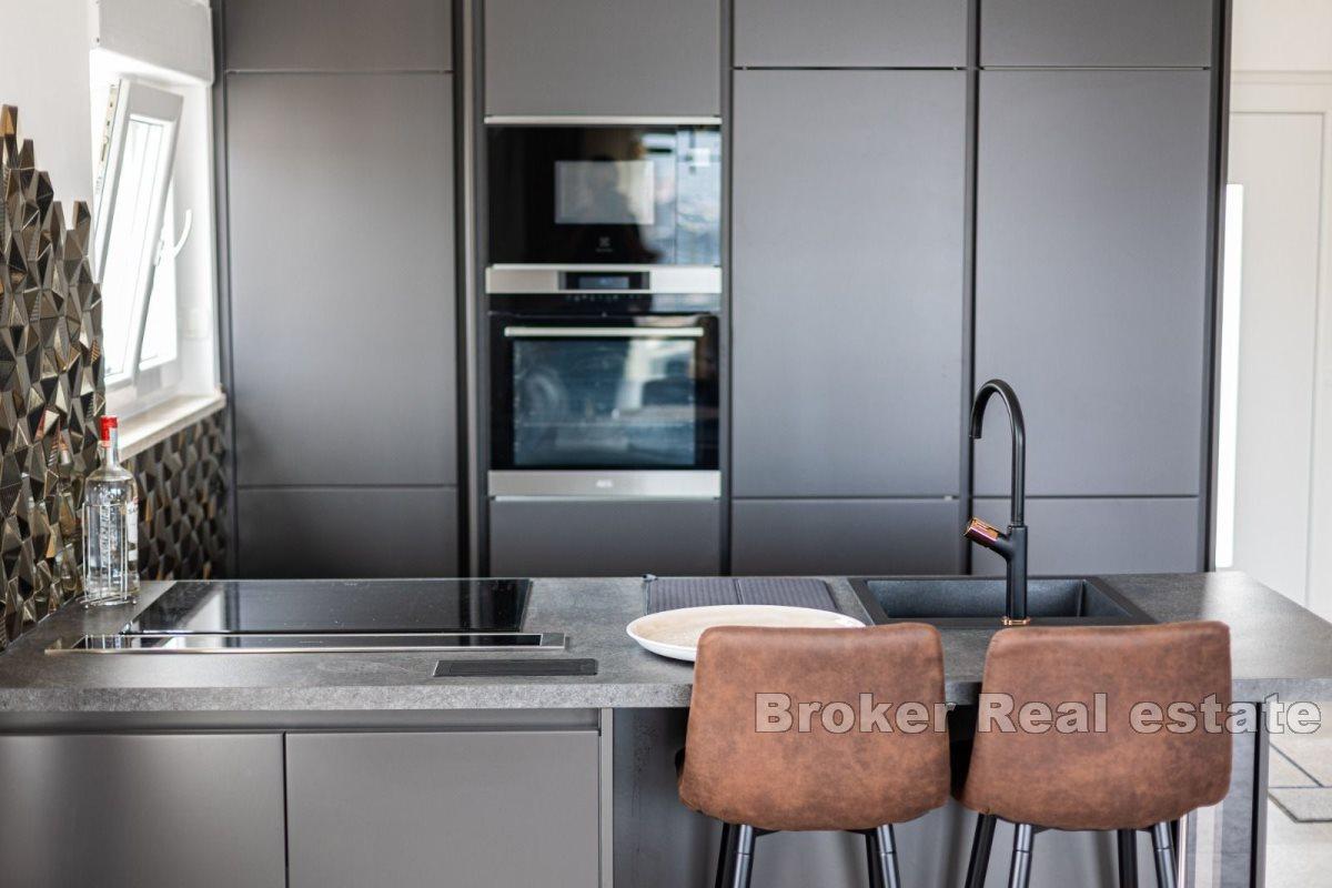 Penthouse with roof terrace and sea view