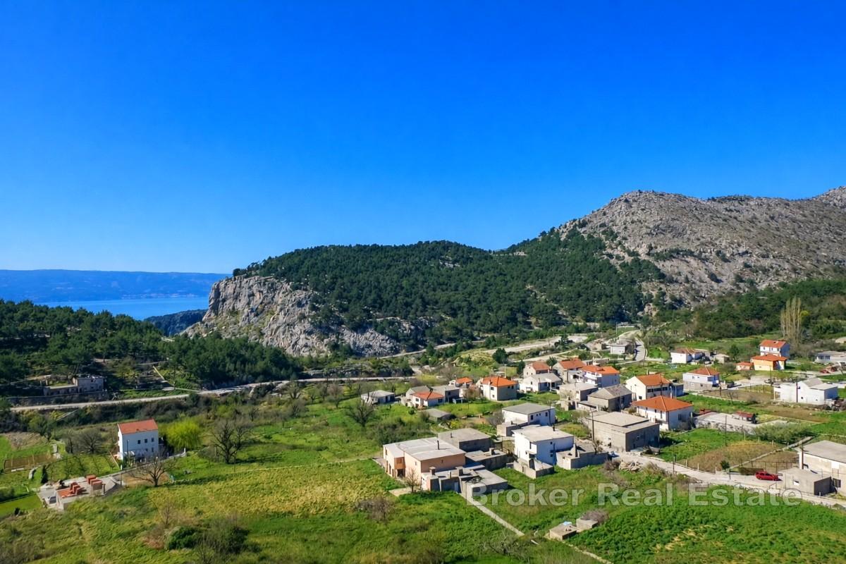 Stavební pozemek se stávající zástavbou