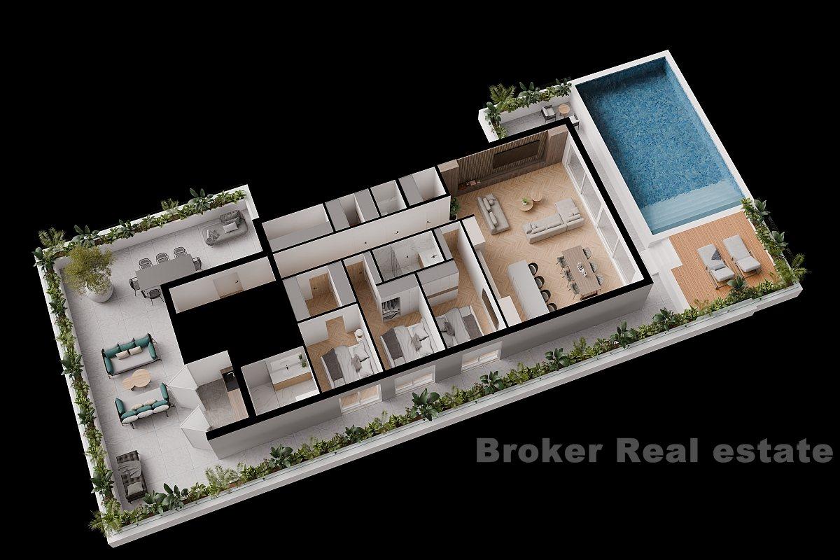 Moderne toppleilighet med basseng og havutsikt