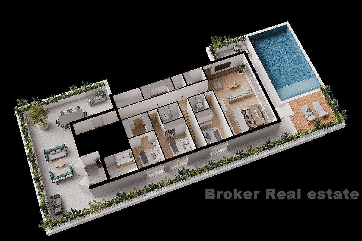 Moderne toppleilighet med basseng og havutsikt