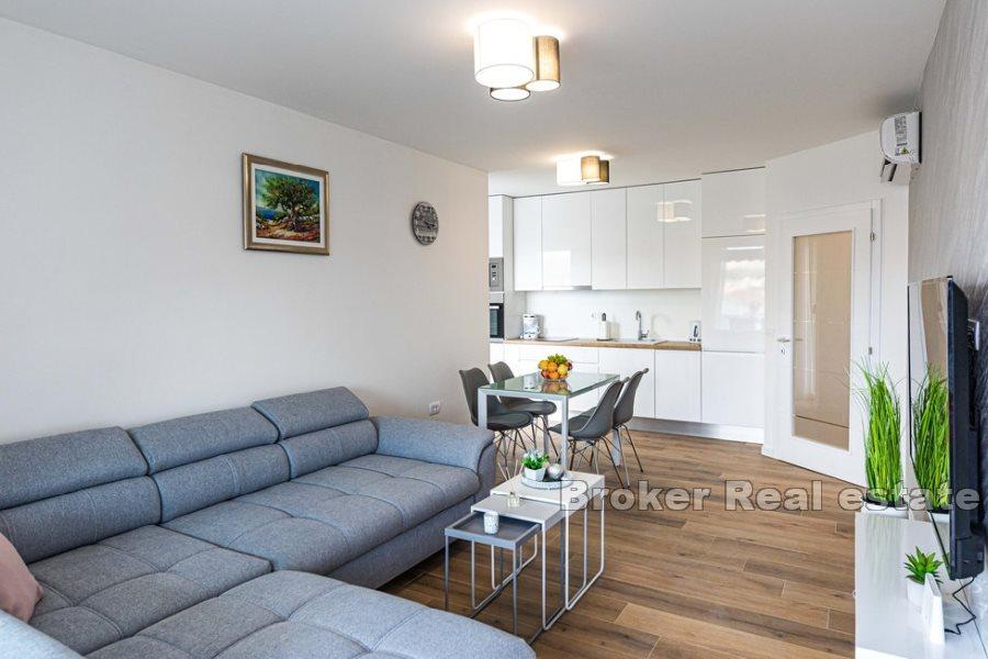 Luxusní byt v novostavbě u moře