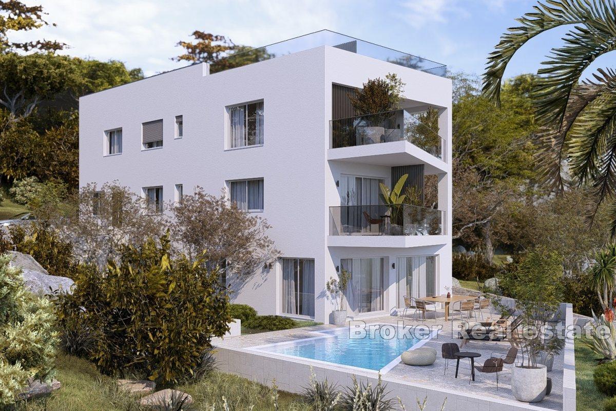 Moderne Dreizimmerwohnung mit Schwimmbad in erster Reihe zum Meer